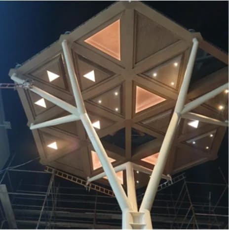 Illuminated underside of the geometric structure at SEVEN Al-Madinah